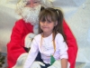 Girl with Santa at BP High Childcare 2006 008.jpg